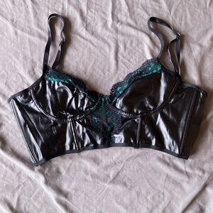 Black bustier crop top with green lace